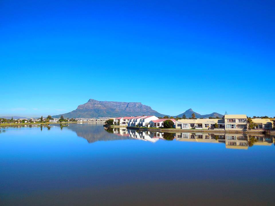 We love how still the water is and the reflection of the mountain in the water!