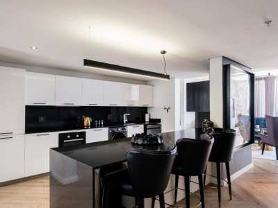 Modern Kitchen with Sleek Finishes at 413 Harbour Bridge