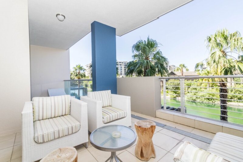 Kylemore 104 – Spacious private terrace overlooking the tranquil marina canals, offering comfortable outdoor seating and a peaceful setting to enjoy morning coffee or unwind after a day exploring the V&A Waterfront.