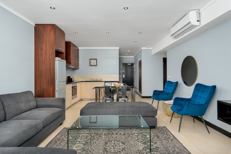 Modern Central City Suite spacious open-plan lounge and dining area