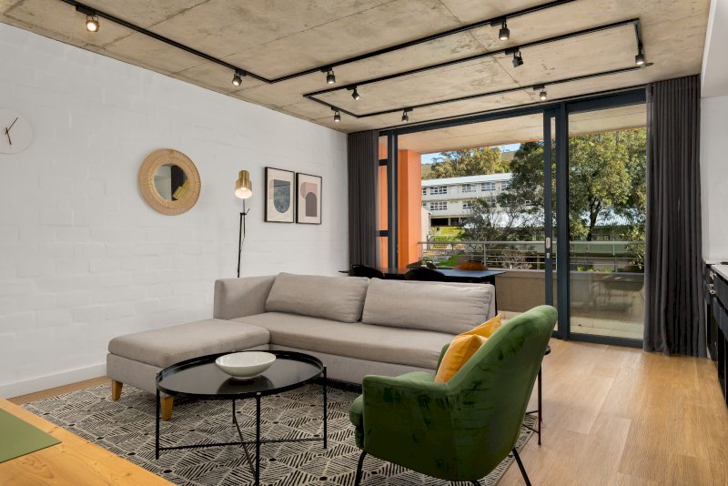 Bo-Kaap Retreat modern open-plan lounge with balcony access