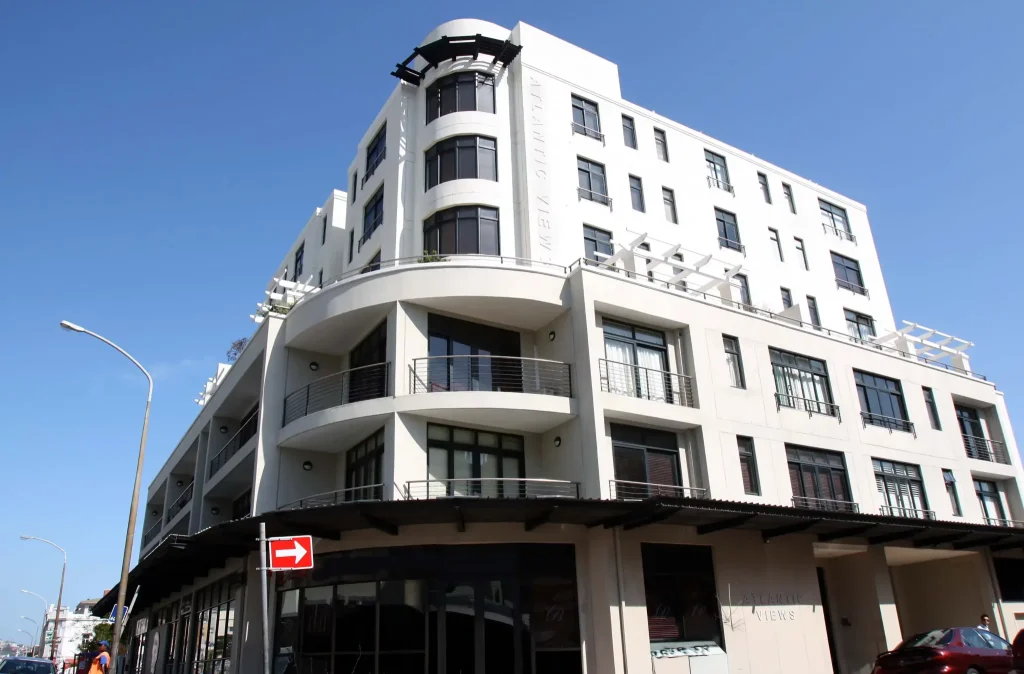 Ocean's Reflection – Exterior view of the contemporary Atlantic Views apartment building.