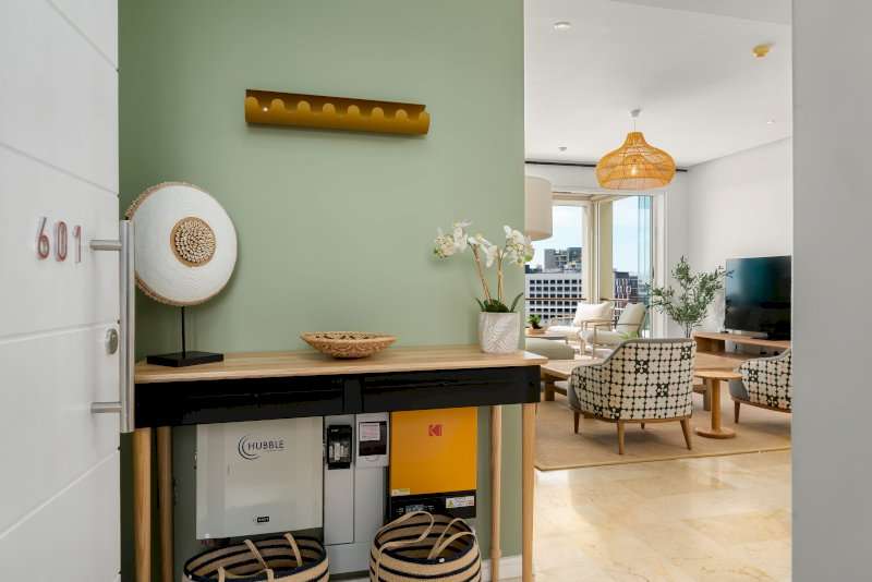 Carradale 3-Bed – Entrance & Living Area – Welcoming entrance leading into the light-filled apartment, with soft natural tones and stylish contemporary décor.