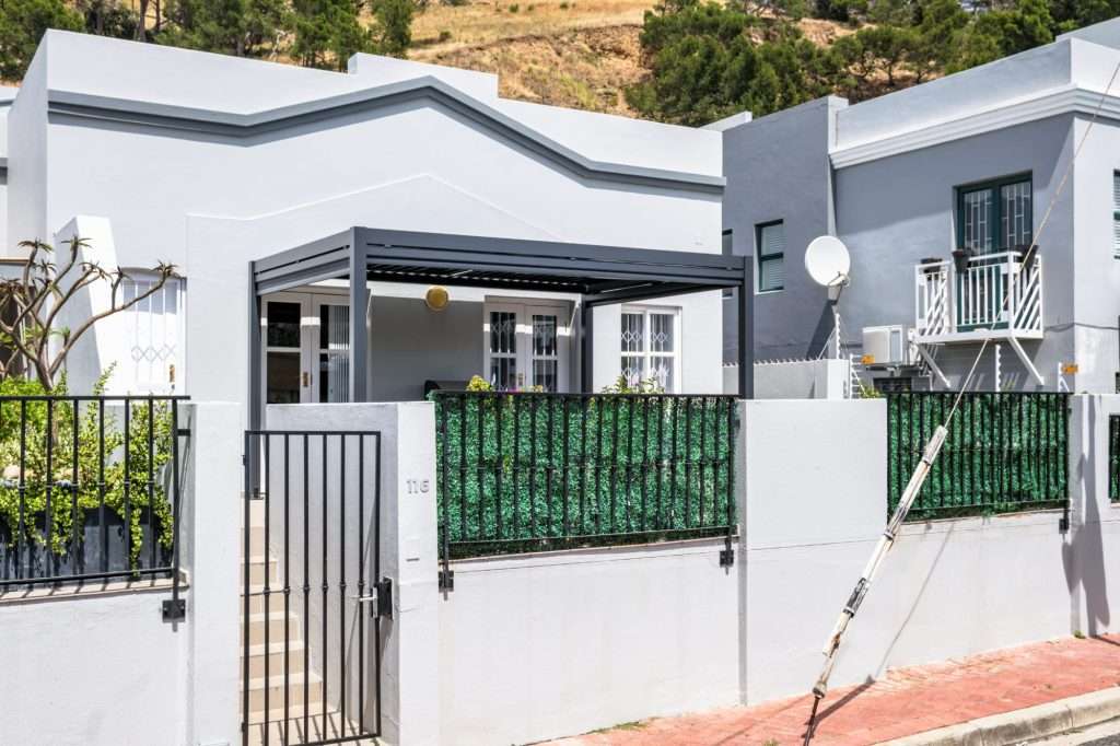 De Waterkant DW-001 – Exterior – Charming contemporary De Waterkant home with a private entrance and covered front terrace.