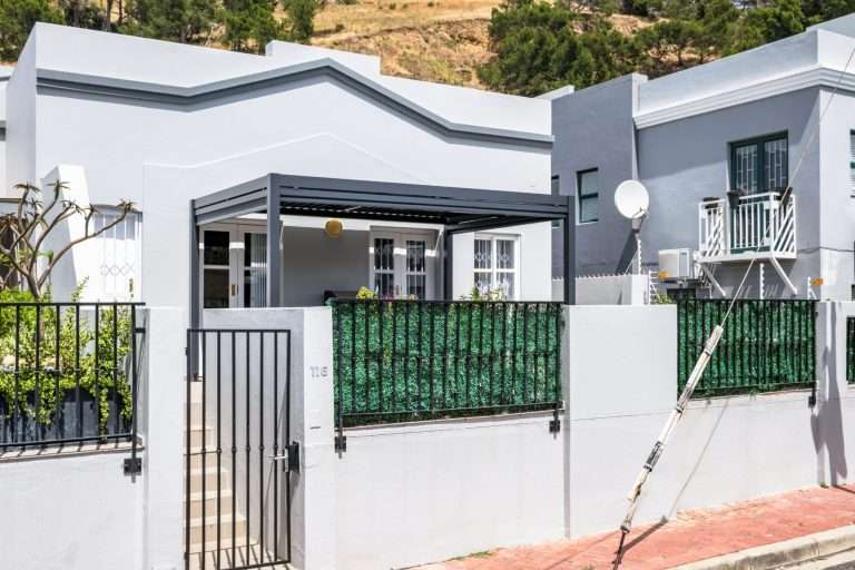 De Waterkant DW-001 – Exterior – Charming contemporary De Waterkant home with a private entrance and covered front terrace.