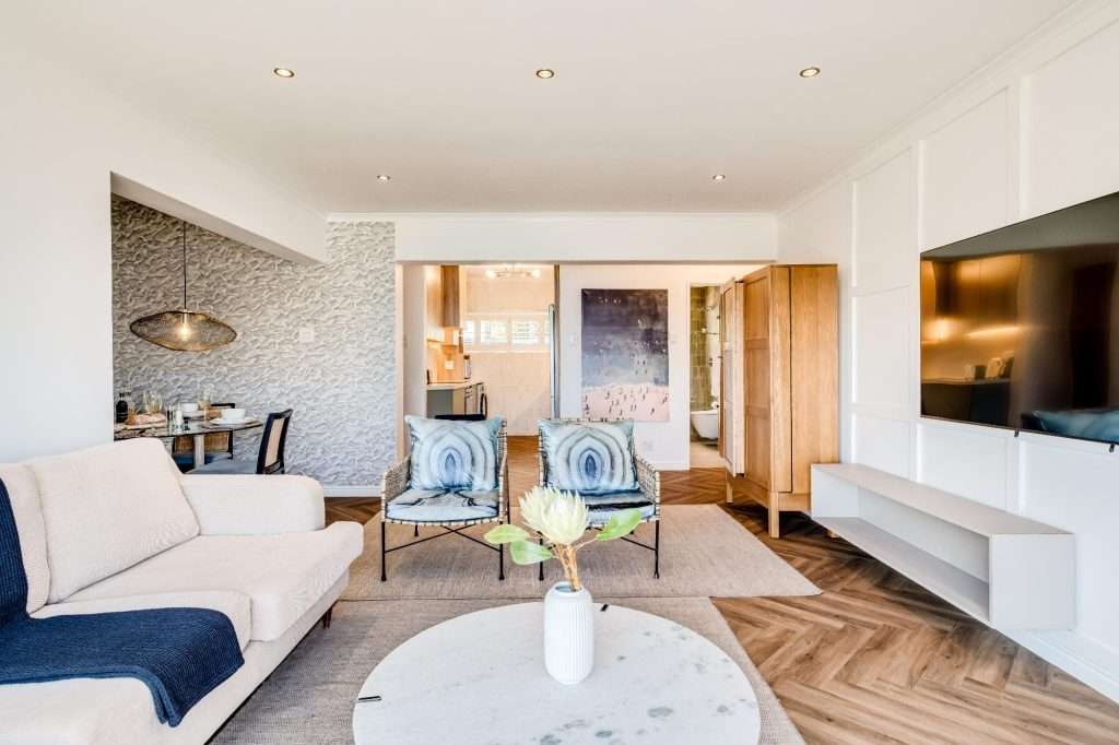 Shoreline Views – Open-Plan Living Area – Spacious and beautifully presented living space combining comfortable seating, dining and easy access to the kitchen.
