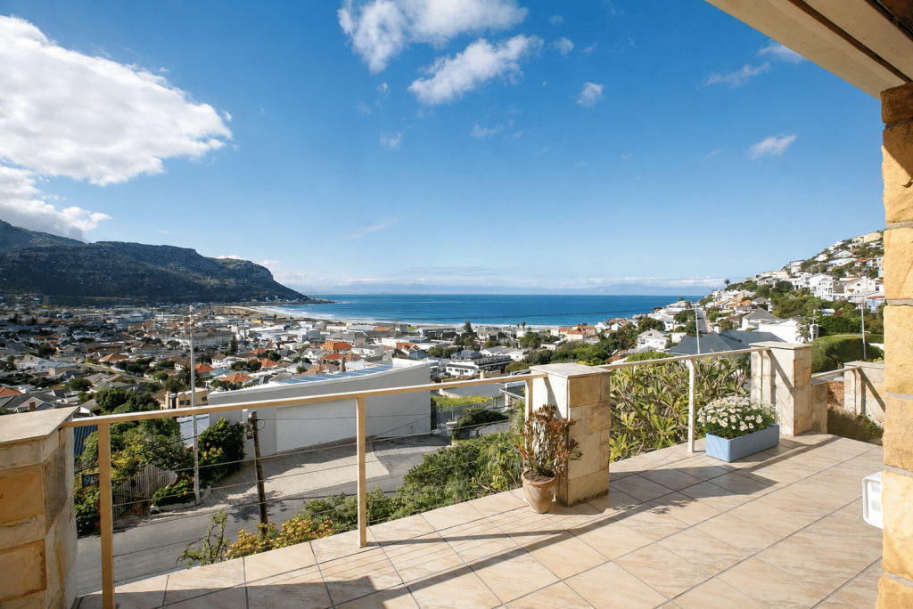 The Perch – Panoramic Coastal Views – Expansive terrace overlooking the neighbourhood towards the sparkling False Bay coastline and surrounding mountains.