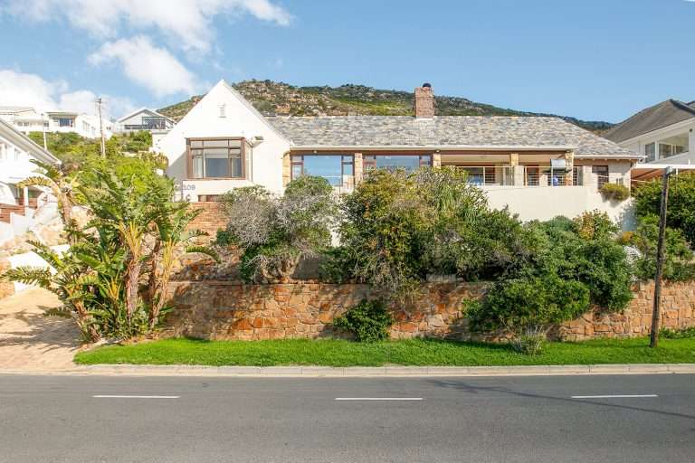 The Perch – Exterior – Charming mountainside home surrounded by established greenery and positioned high above the coastal neighbourhood.