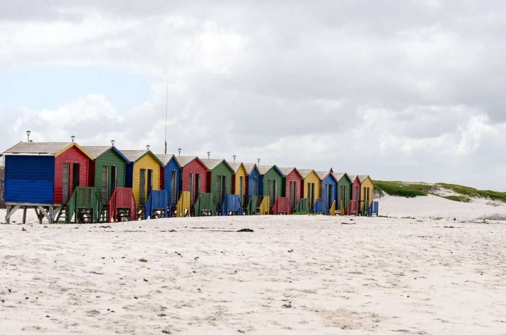 Colourful beach huts on Muizenberg Beach in False Bay.
